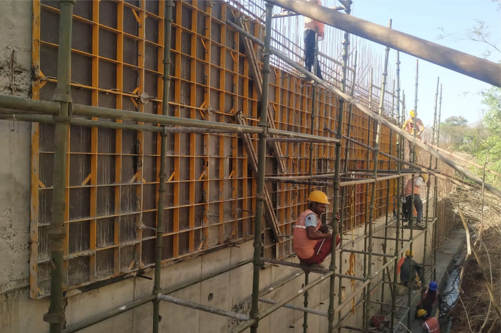 Formwork panels being aligned at the SSC Plant